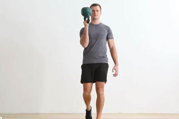 Men’s Walking Single-Arm Bottom-Up Kettlebell Racked Carry