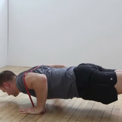 Feet-Elevated Band-Resisted Pushup
